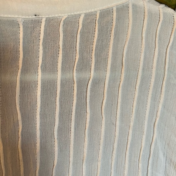 Cute lightweight button down top with embroidery on bottom and lower sleeve - Picture 5 of 6